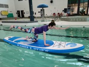 Paddle board yoga at Accora Village