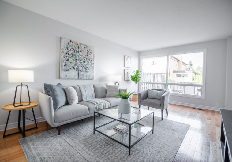 Townhome Living Room with large windows looking onto patio