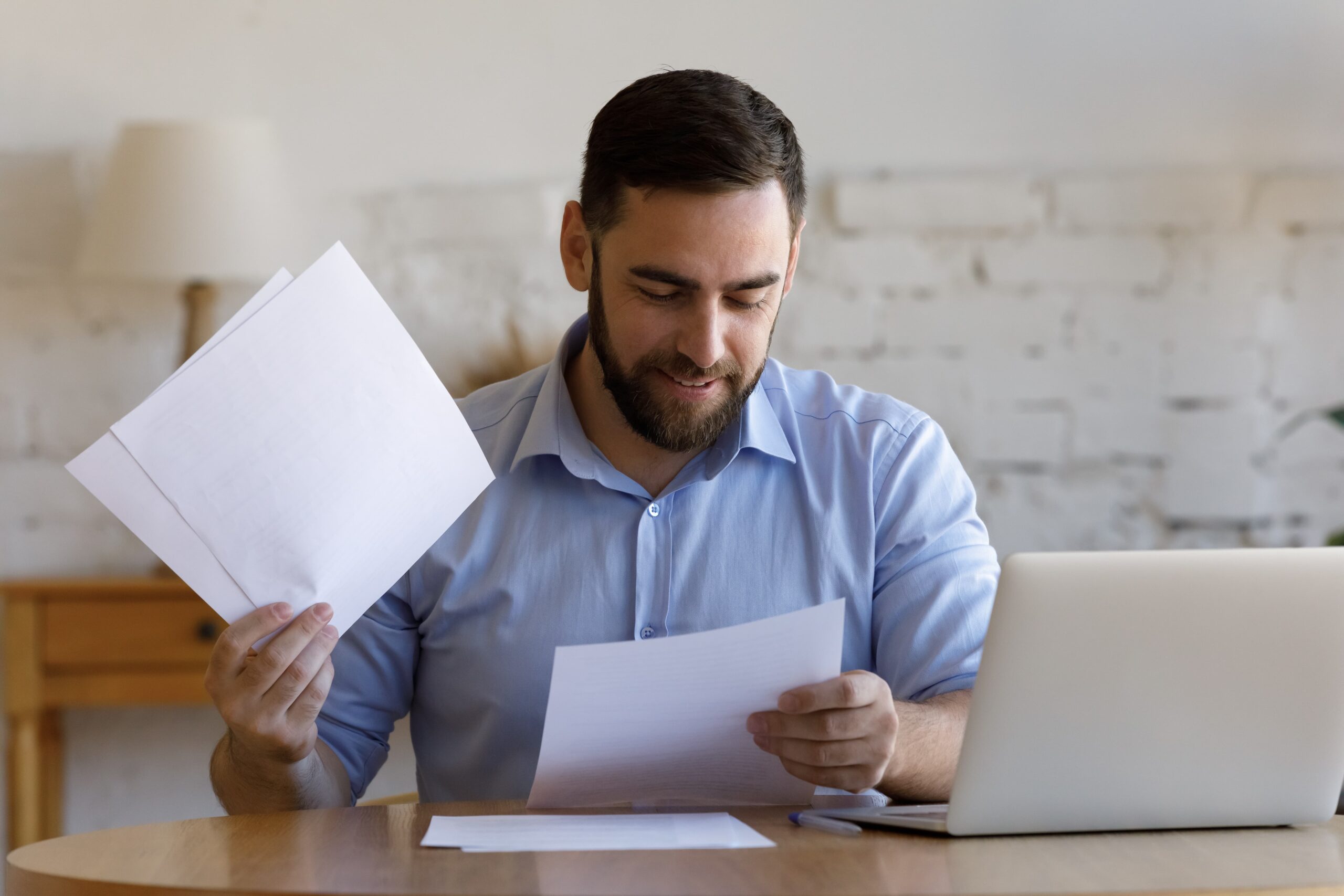 Young man looking at rental options
