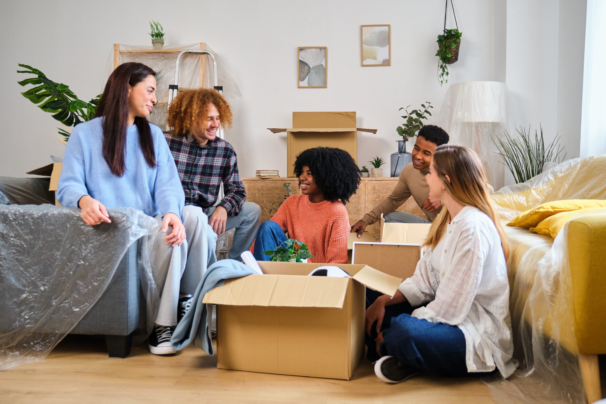 Young adults spending time together in an apartment living area